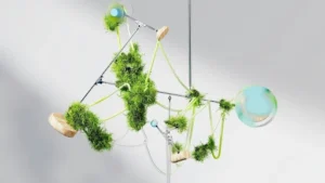 Modern hanging sculpture with greenery and connected tubes