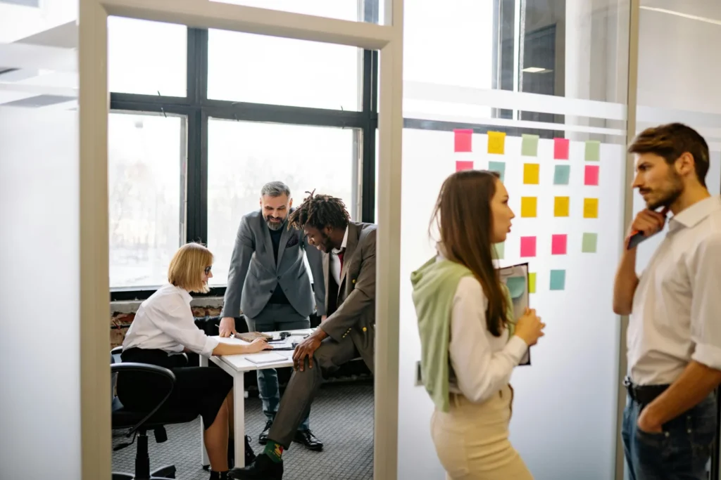 Both the AI centre of excellence vs decentralised model have value, and hybrid approaches work well also.